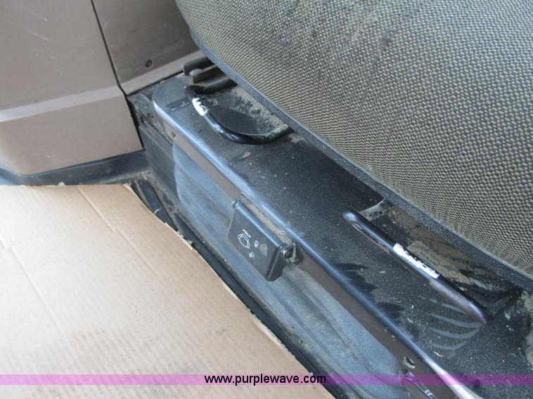 image for item G8824 1999 John Deere 7410 MFWD tractor