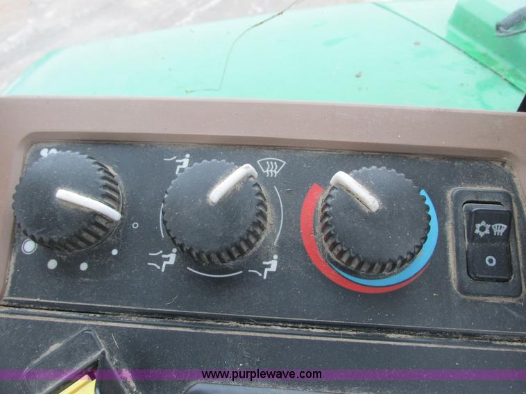 image for item G8824 1999 John Deere 7410 MFWD tractor