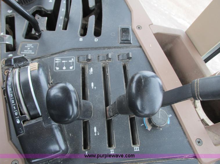 image for item G8824 1999 John Deere 7410 MFWD tractor