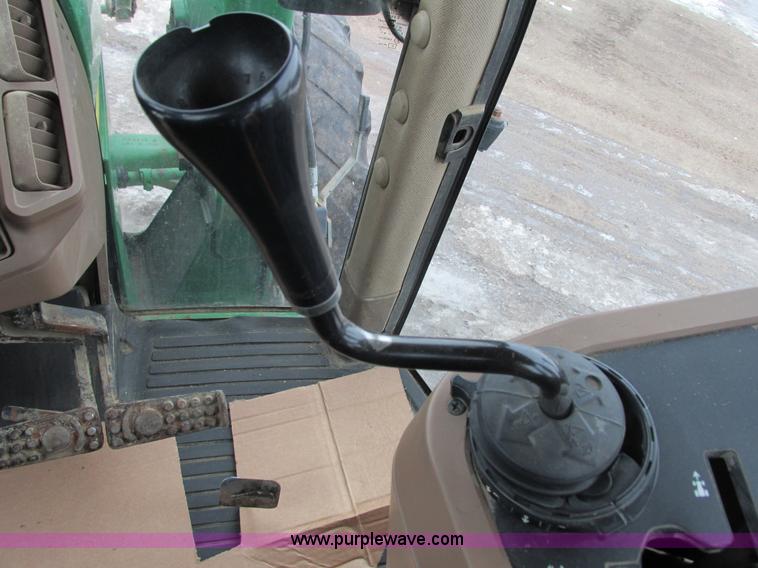 image for item G8824 1999 John Deere 7410 MFWD tractor