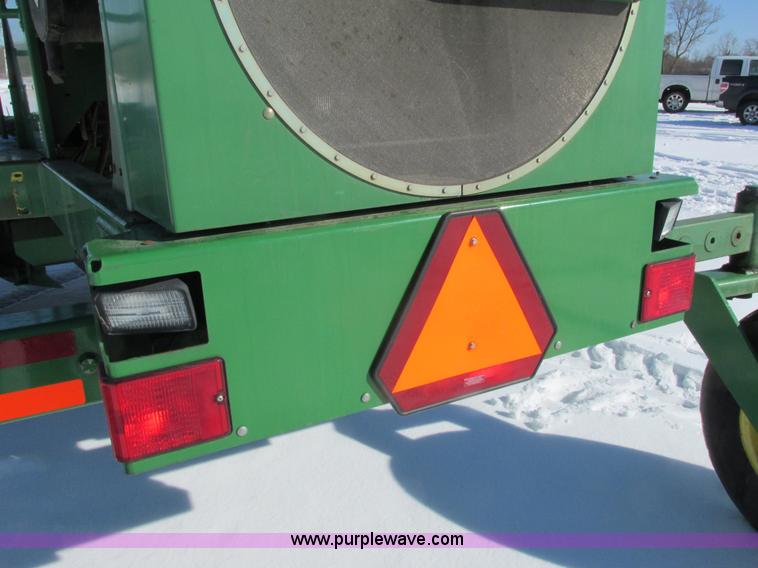 image for item G8829 2003 John Deere 4895 self-propelled windrower