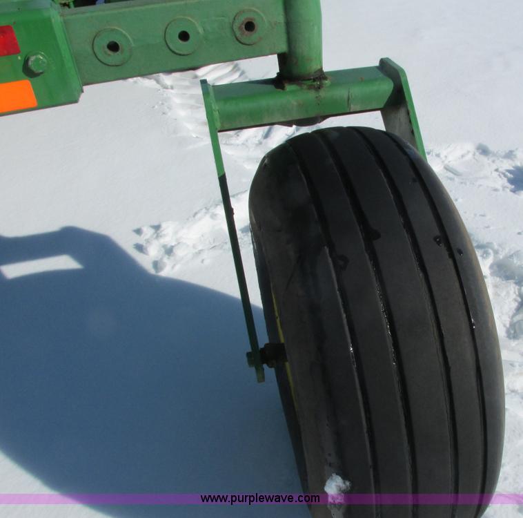 image for item G8829 2003 John Deere 4895 self-propelled windrower