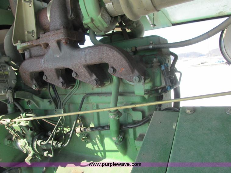 image for item G8829 2003 John Deere 4895 self-propelled windrower