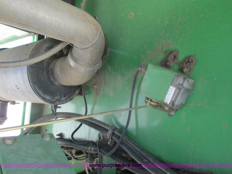 image for item G8829 2003 John Deere 4895 self-propelled windrower