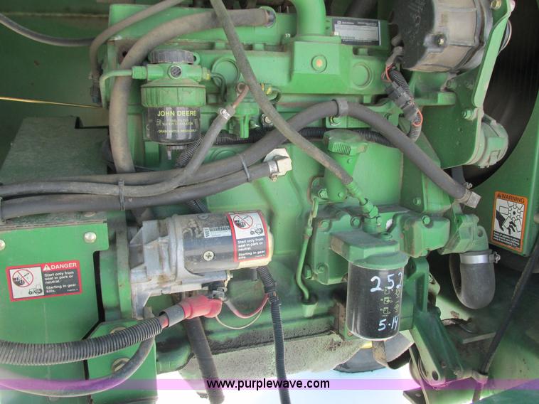 image for item G8829 2003 John Deere 4895 self-propelled windrower