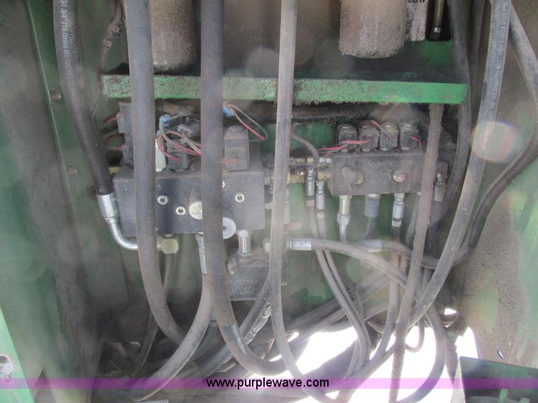 image for item G8829 2003 John Deere 4895 self-propelled windrower