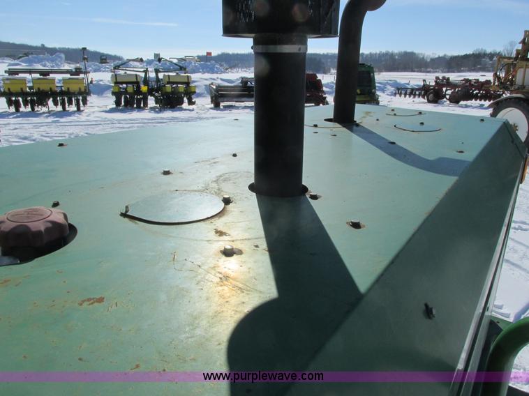 image for item G8829 2003 John Deere 4895 self-propelled windrower