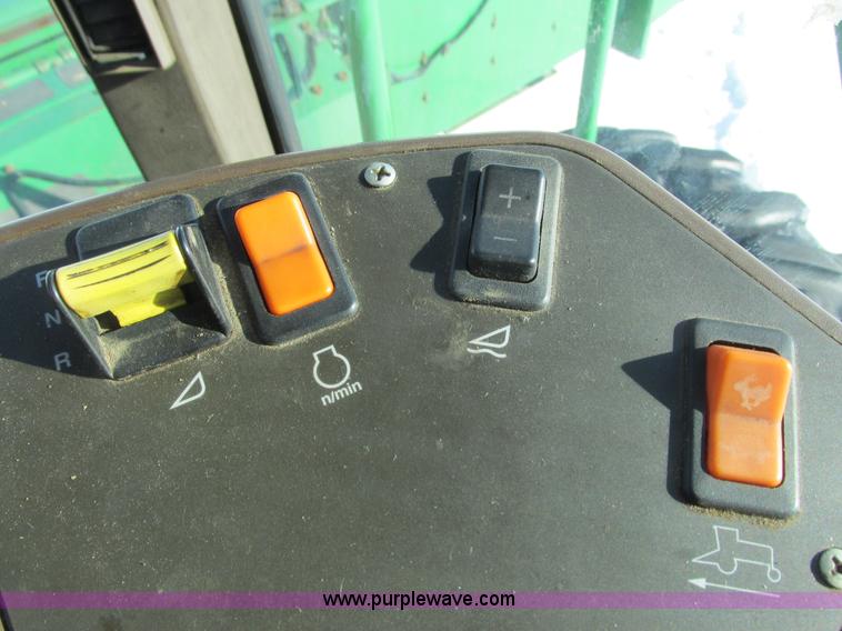 image for item G8829 2003 John Deere 4895 self-propelled windrower