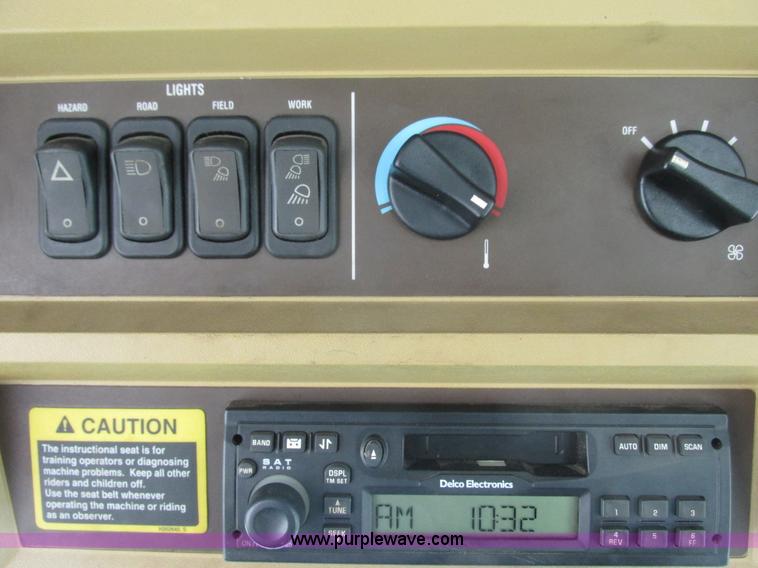 image for item G8829 2003 John Deere 4895 self-propelled windrower