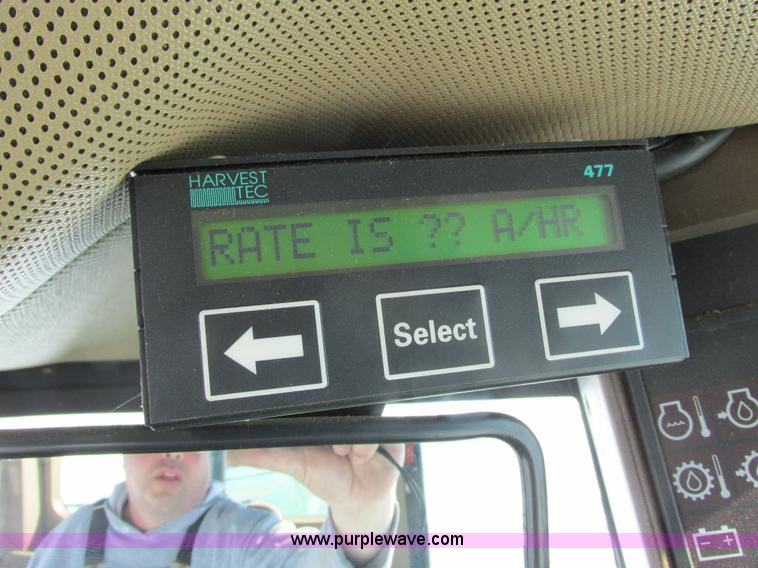 image for item G8829 2003 John Deere 4895 self-propelled windrower