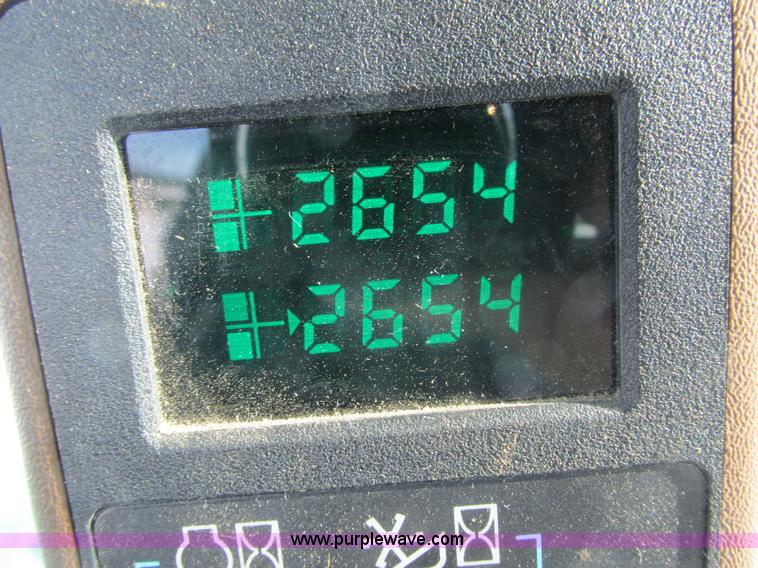 image for item G8829 2003 John Deere 4895 self-propelled windrower