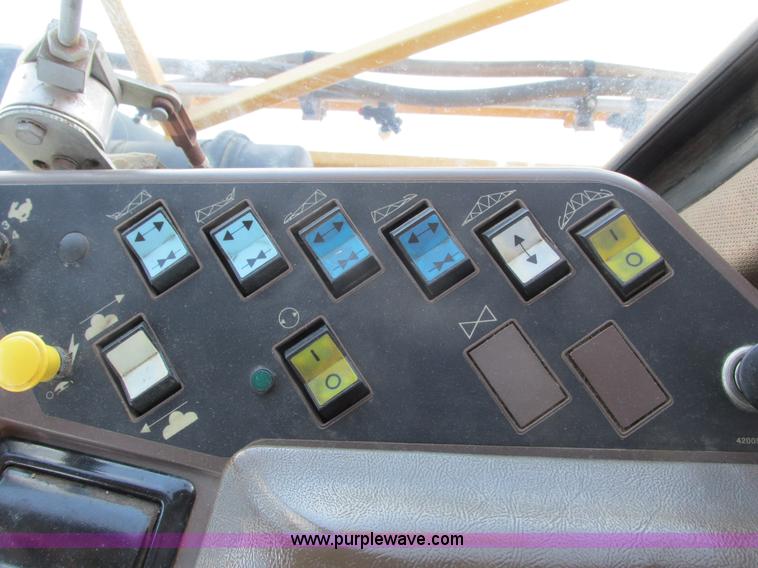 image for item G8830 1997 Ag-Chem RoGator 854 self-propelled sprayer