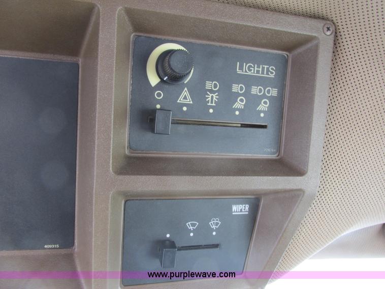 image for item G8830 1997 Ag-Chem RoGator 854 self-propelled sprayer