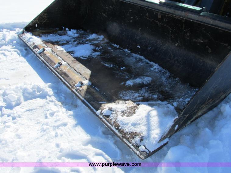 image for item G8831 2012 John Deere 318D skid steer