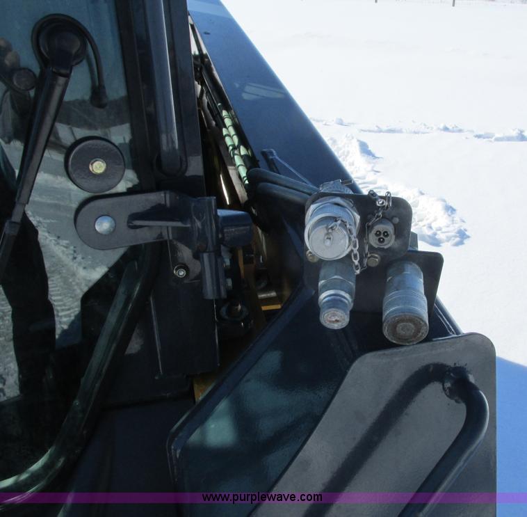 image for item G8831 2012 John Deere 318D skid steer