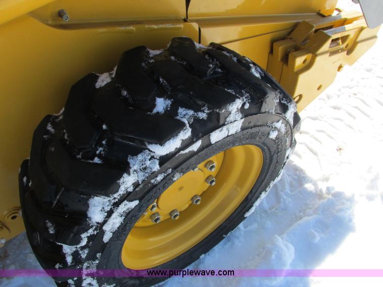 image for item G8831 2012 John Deere 318D skid steer