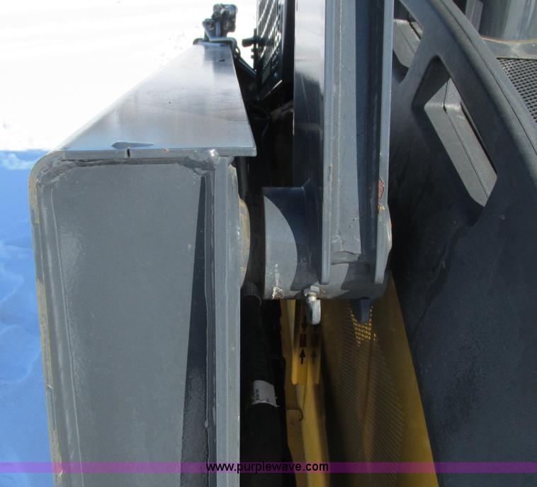 image for item G8831 2012 John Deere 318D skid steer