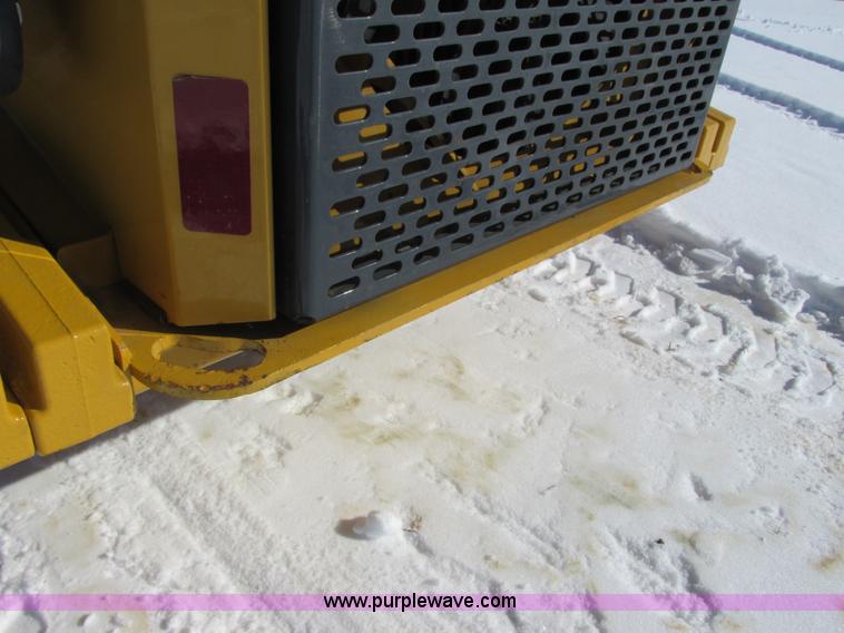 image for item G8831 2012 John Deere 318D skid steer