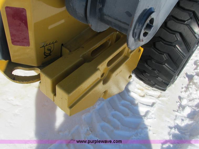 image for item G8831 2012 John Deere 318D skid steer