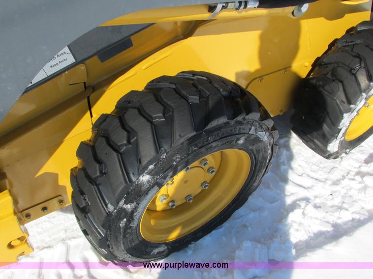 image for item G8831 2012 John Deere 318D skid steer
