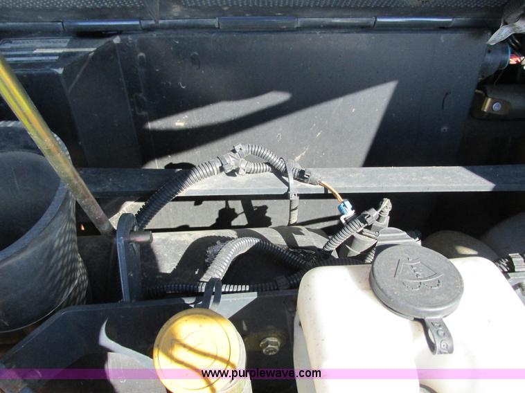 image for item G8831 2012 John Deere 318D skid steer