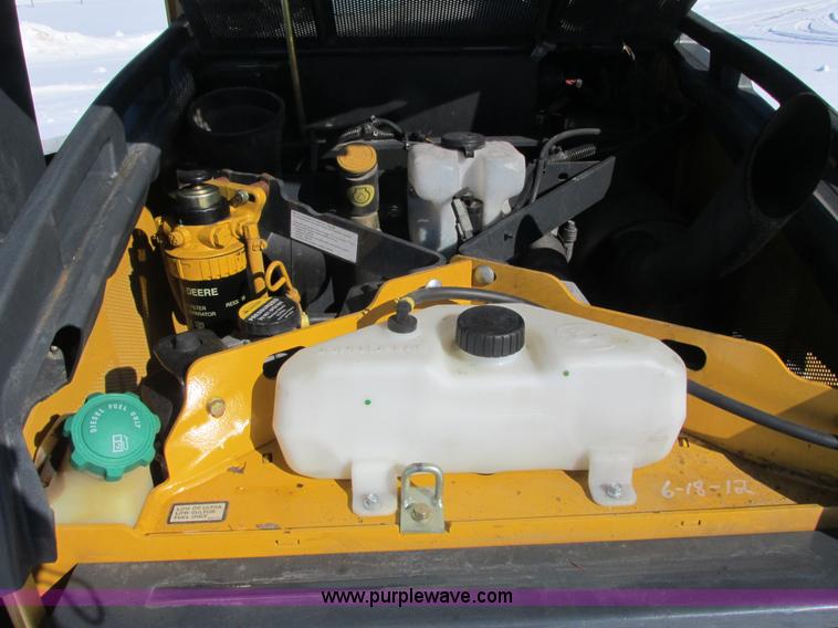 image for item G8831 2012 John Deere 318D skid steer