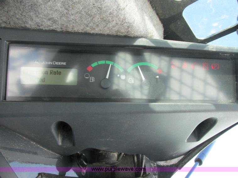 image for item G8831 2012 John Deere 318D skid steer
