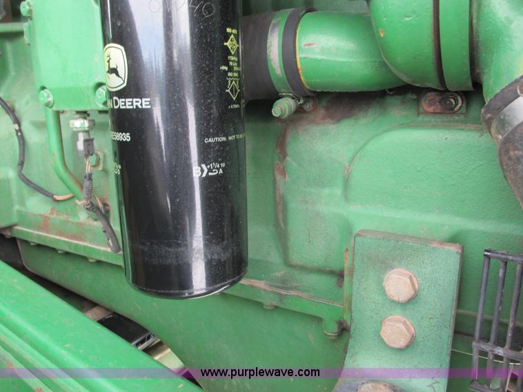 image for item G8853 2005 John Deere 9520 4WD tractor