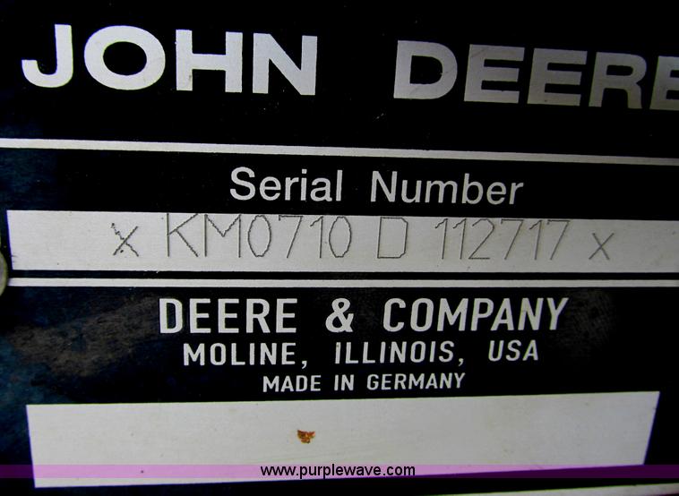 image for item G8859 2009 John Deere 710 Row Trac rotary forage harvester head