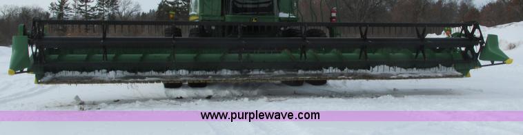 image for item G8864 2010 John Deere 635F flex head