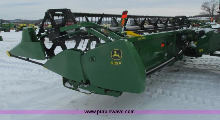 image for item G8864 2010 John Deere 635F flex head