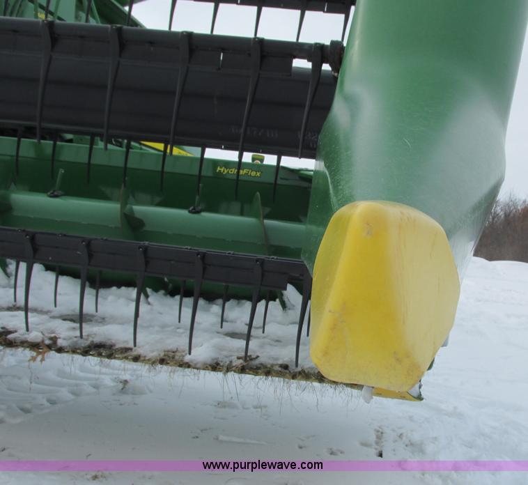 image for item G8864 2010 John Deere 635F flex head
