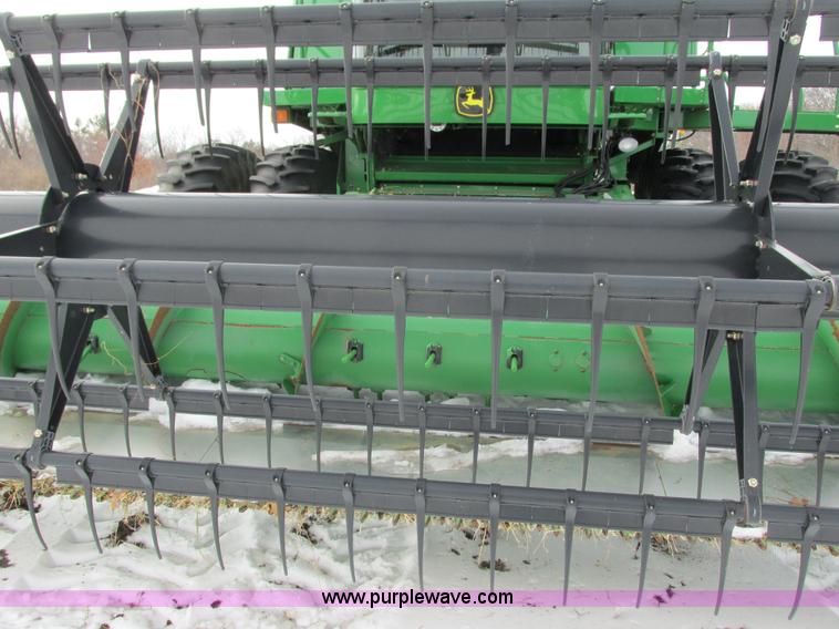 image for item G8864 2010 John Deere 635F flex head