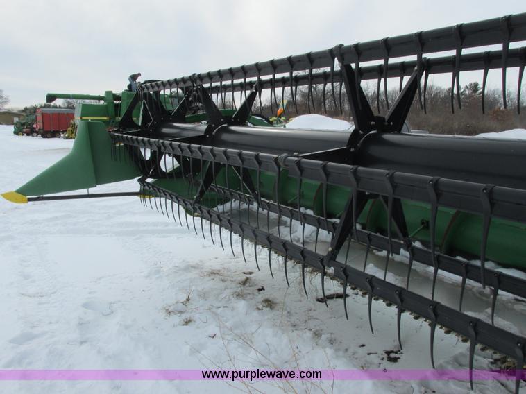 image for item G8864 2010 John Deere 635F flex head