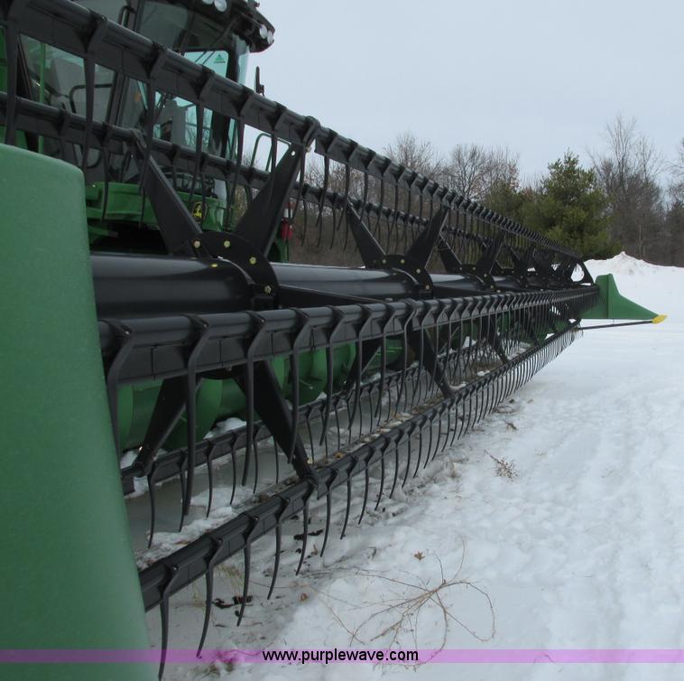 image for item G8864 2010 John Deere 635F flex head