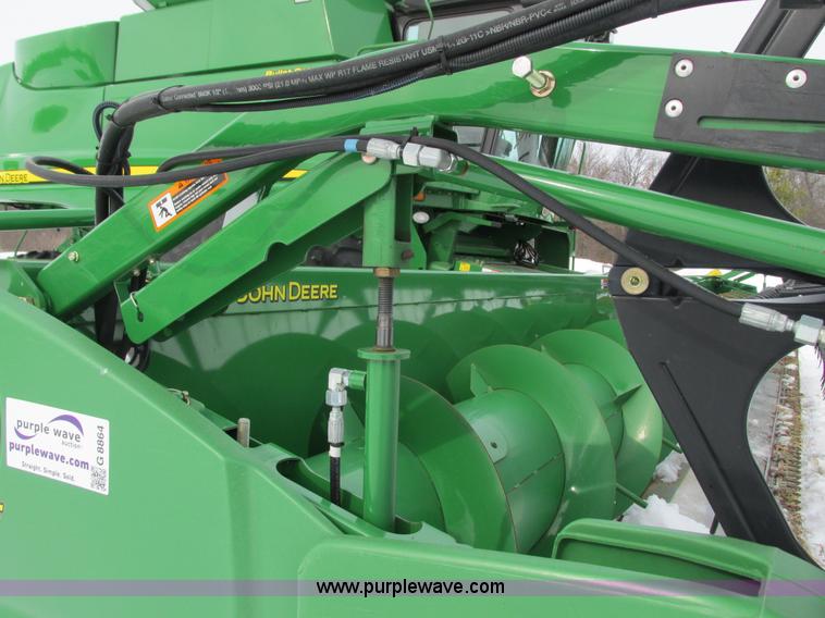 image for item G8864 2010 John Deere 635F flex head