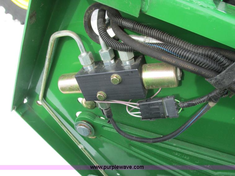 image for item G8864 2010 John Deere 635F flex head