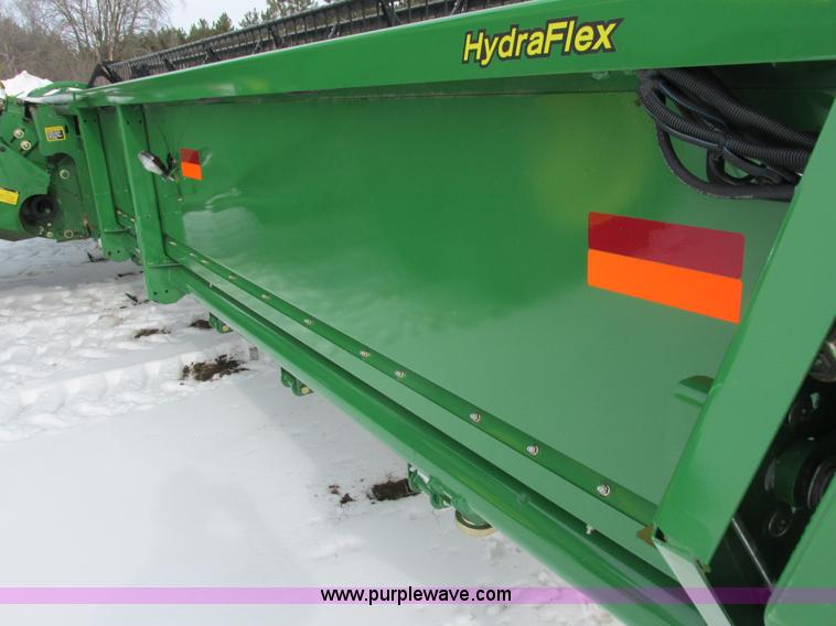 image for item G8864 2010 John Deere 635F flex head