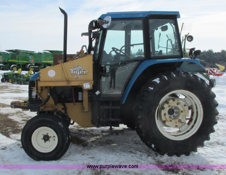 image for item G8870 2000 New Holland TS100 tractor