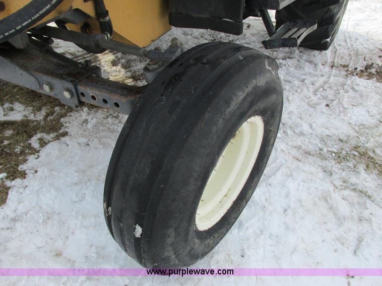 image for item G8870 2000 New Holland TS100 tractor