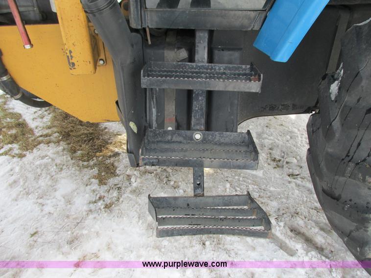 image for item G8870 2000 New Holland TS100 tractor