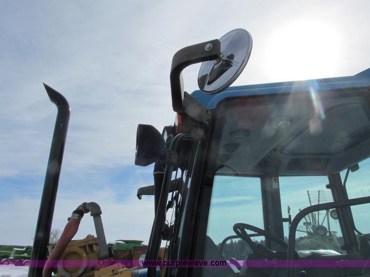 image for item G8870 2000 New Holland TS100 tractor