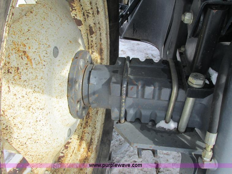 image for item G8870 2000 New Holland TS100 tractor