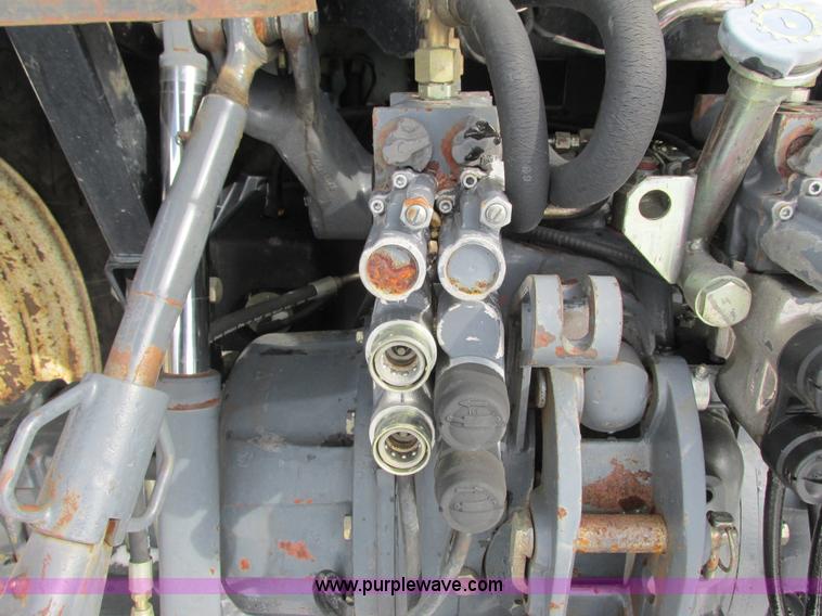 image for item G8870 2000 New Holland TS100 tractor