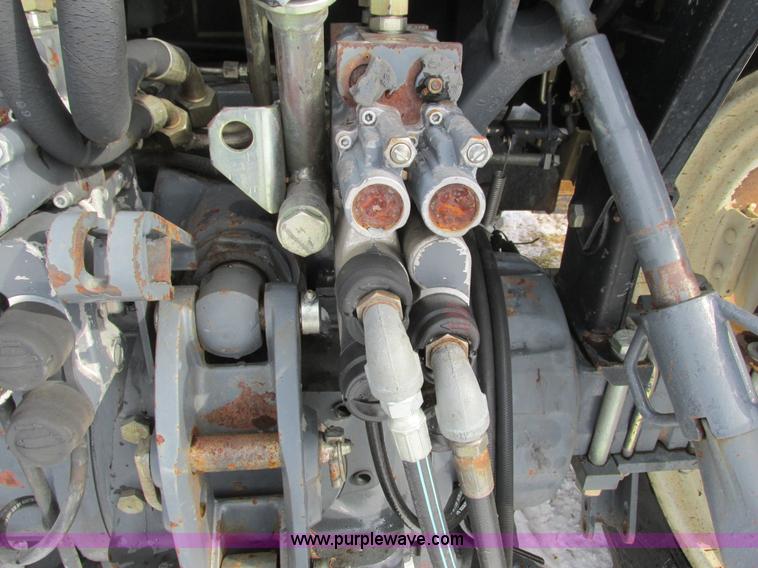 image for item G8870 2000 New Holland TS100 tractor