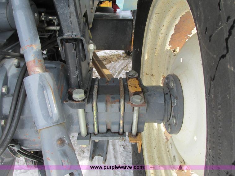 image for item G8870 2000 New Holland TS100 tractor