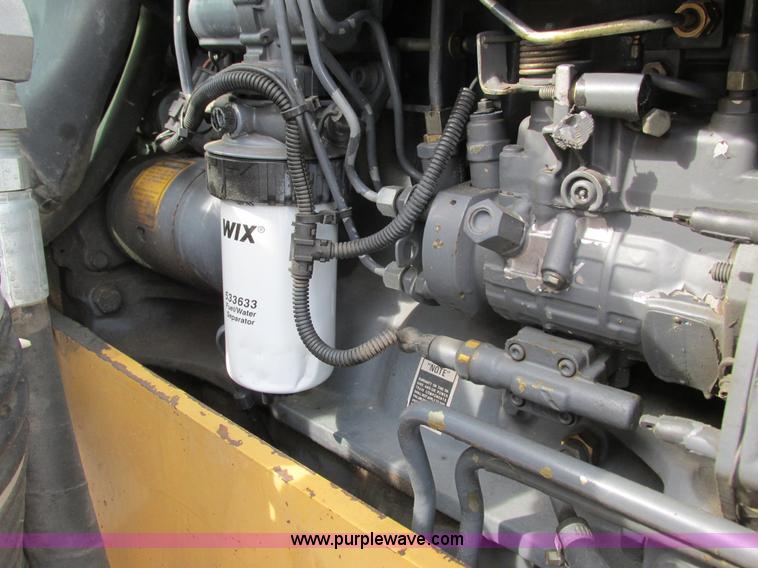 image for item G8870 2000 New Holland TS100 tractor