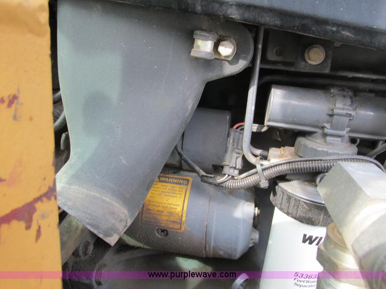 image for item G8870 2000 New Holland TS100 tractor