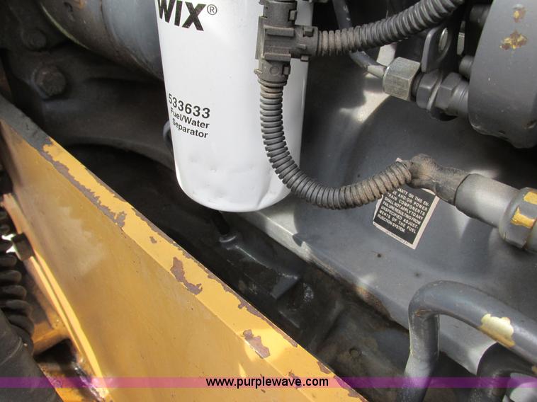 image for item G8870 2000 New Holland TS100 tractor