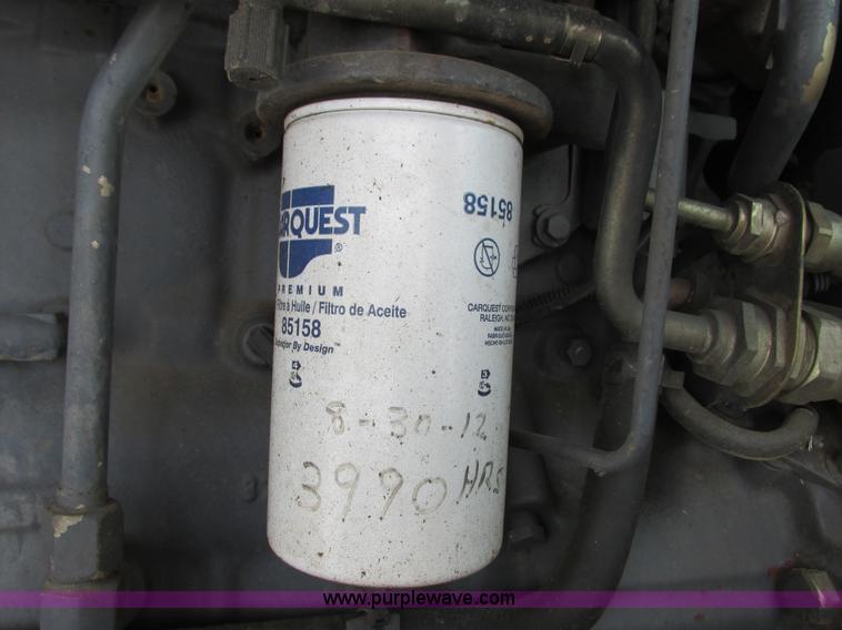 image for item G8870 2000 New Holland TS100 tractor